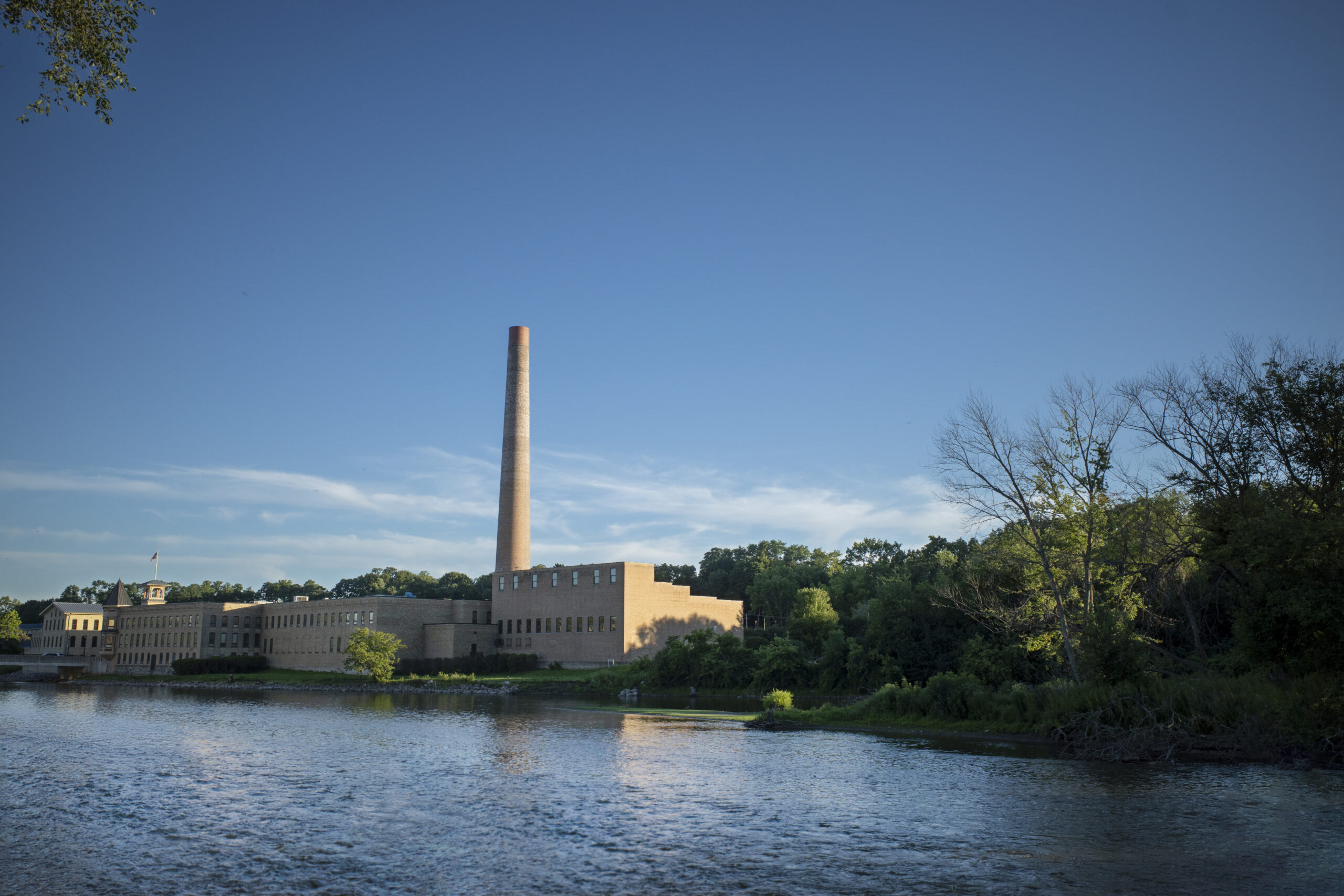 The red-brick Minaret of Masum Shah in Sukkur, rising tall against the blue sky, with its circular design and historic Mughal architecture.”