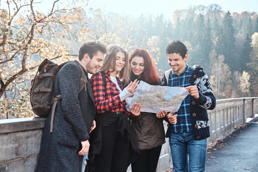 Beautiful couples Tourist in pakistan Shimla Hill Abbottabad reading map before start hiking,