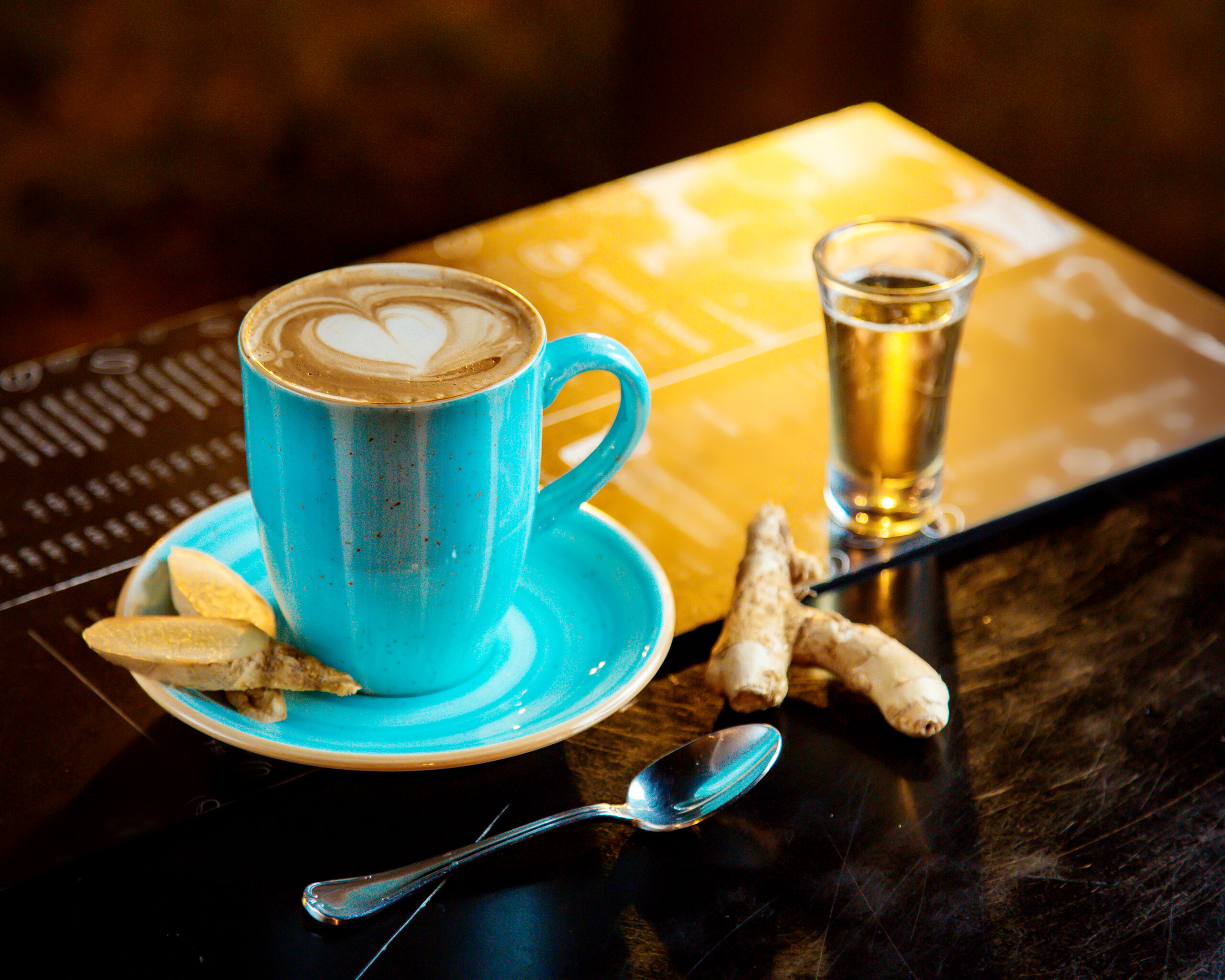 a cup of coffee and shot of tequilla